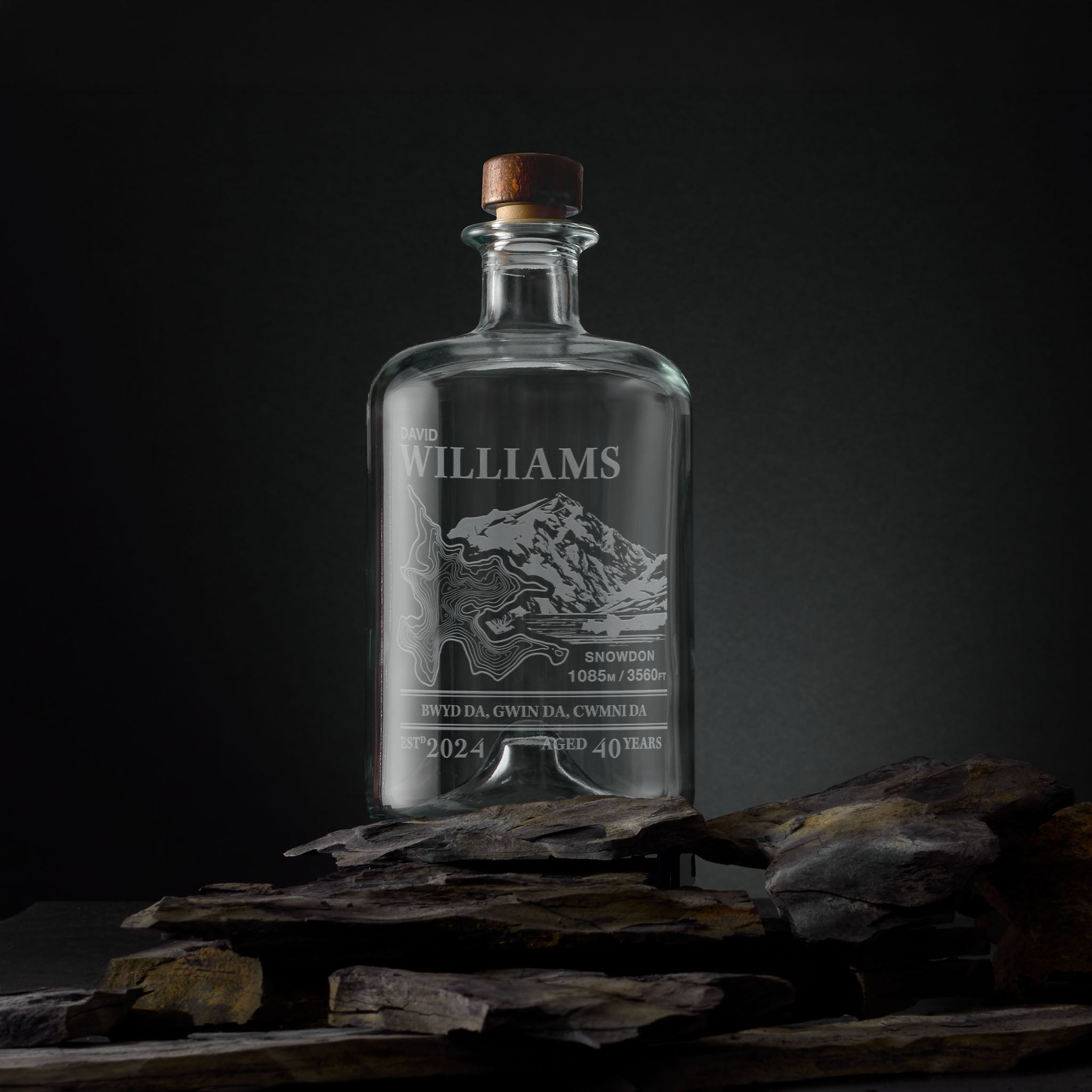 Engraved apothecary-style decanter with Snowdon illustration and topographic map