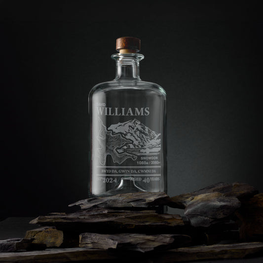 Engraved apothecary-style decanter with Snowdon illustration and topographic map