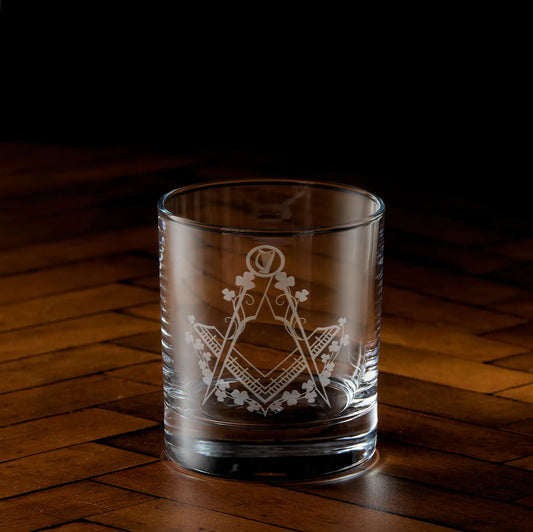 Engraved whisky glass with shamrocks, Irish harp and masonic square and compass design