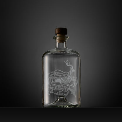 Celtic Knotwork decanter engraved with a stag, circles and flowing anamorphic design