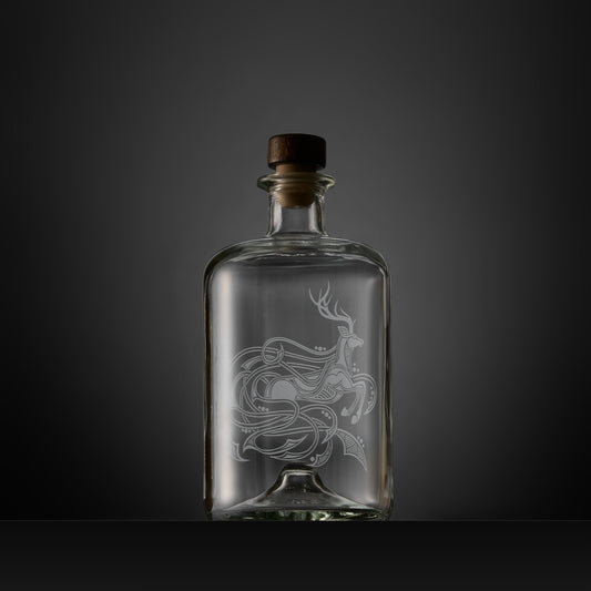 Celtic Knotwork decanter engraved with a stag, circles and flowing anamorphic design