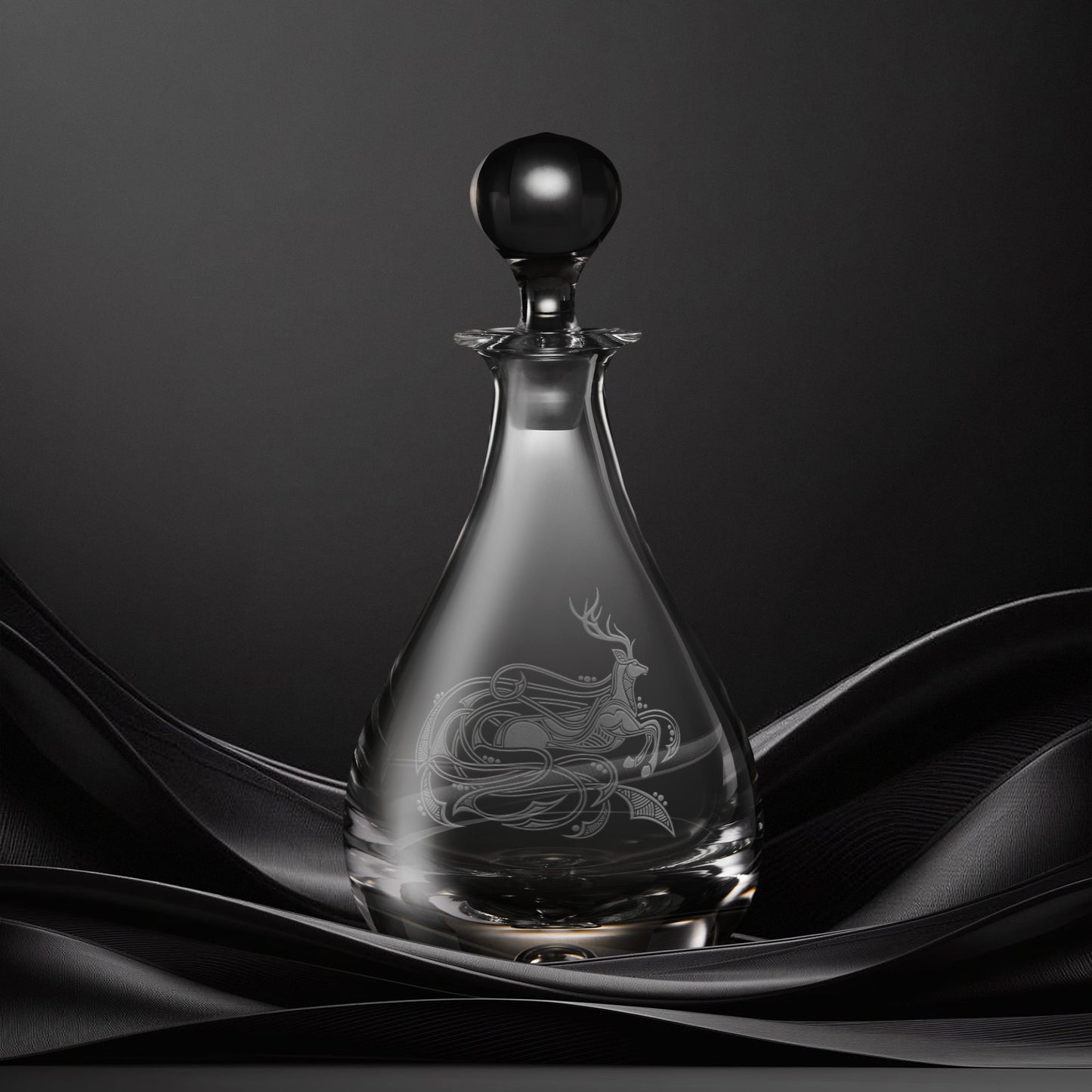Engraved wine decanter with an  illustration of a stag with flowing Celtic knotwork