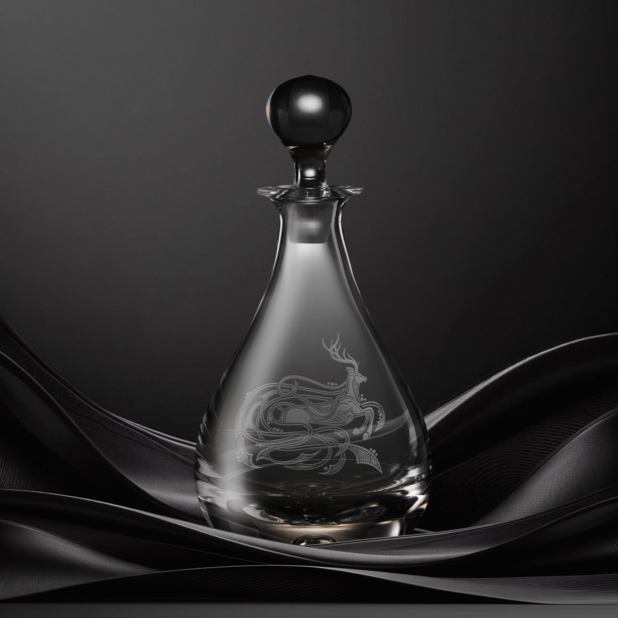 Engraved wine decanter with an  illustration of a stag with flowing Celtic knotwork