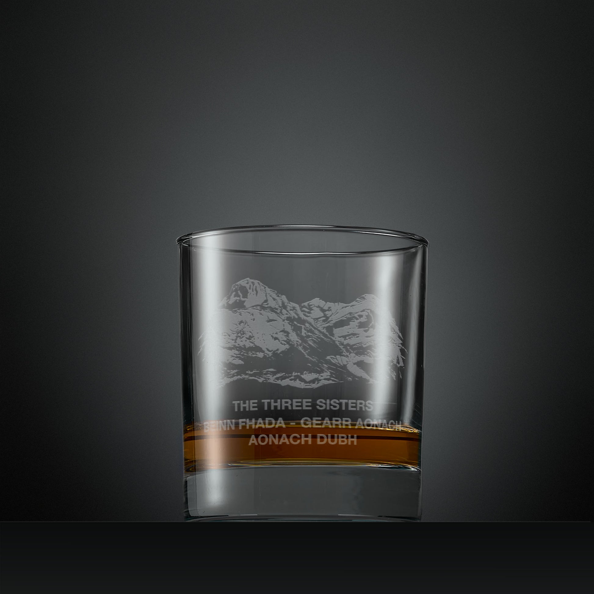 Engraved whisky glass with three sisters, Glencoe illustration