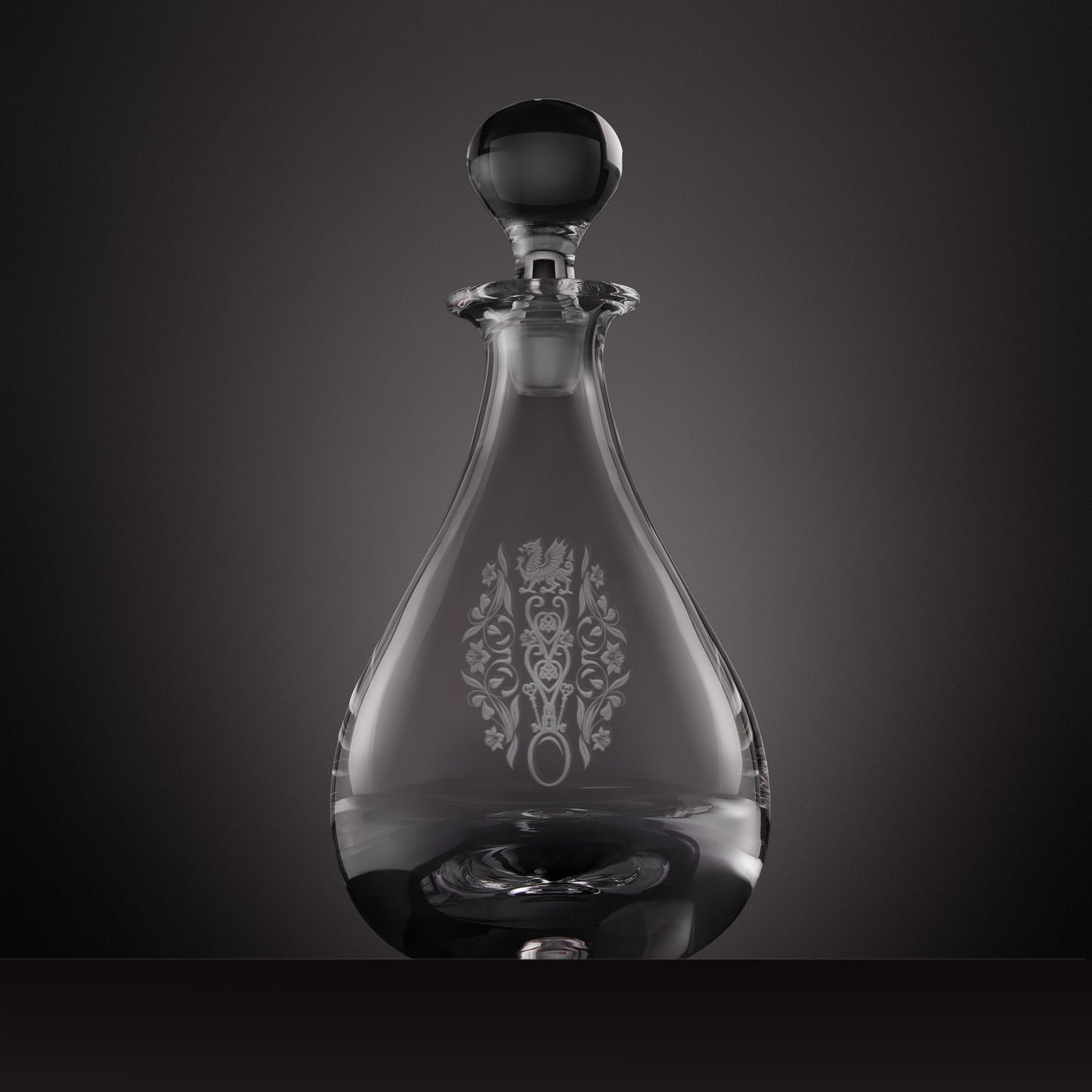 Engraved Welsh lovespoon design featuring the Welsh dragon, entwined hearts, crossed keys and daffodil motifs