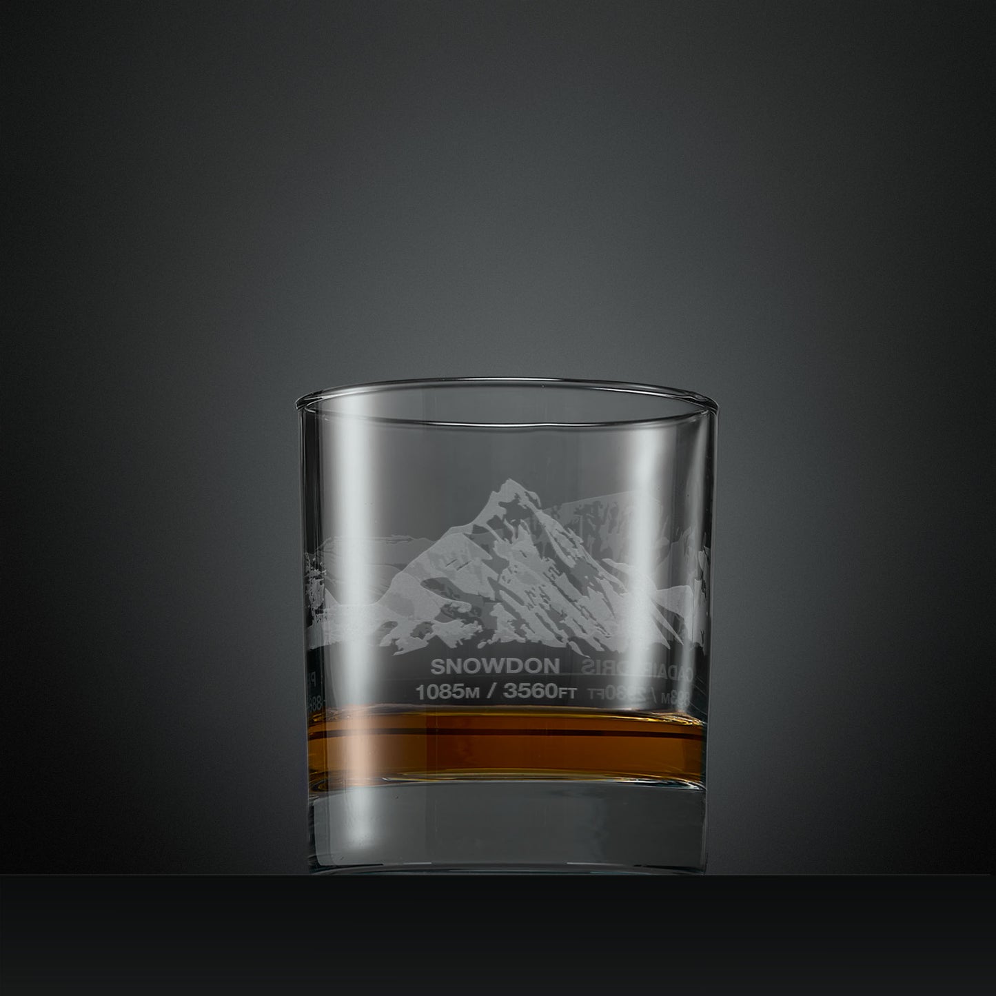 Engraved whisky glass with Welsh three peaks wrap-around design featuring Snowdon, Cadir Idris and Pen-Y-Fan
