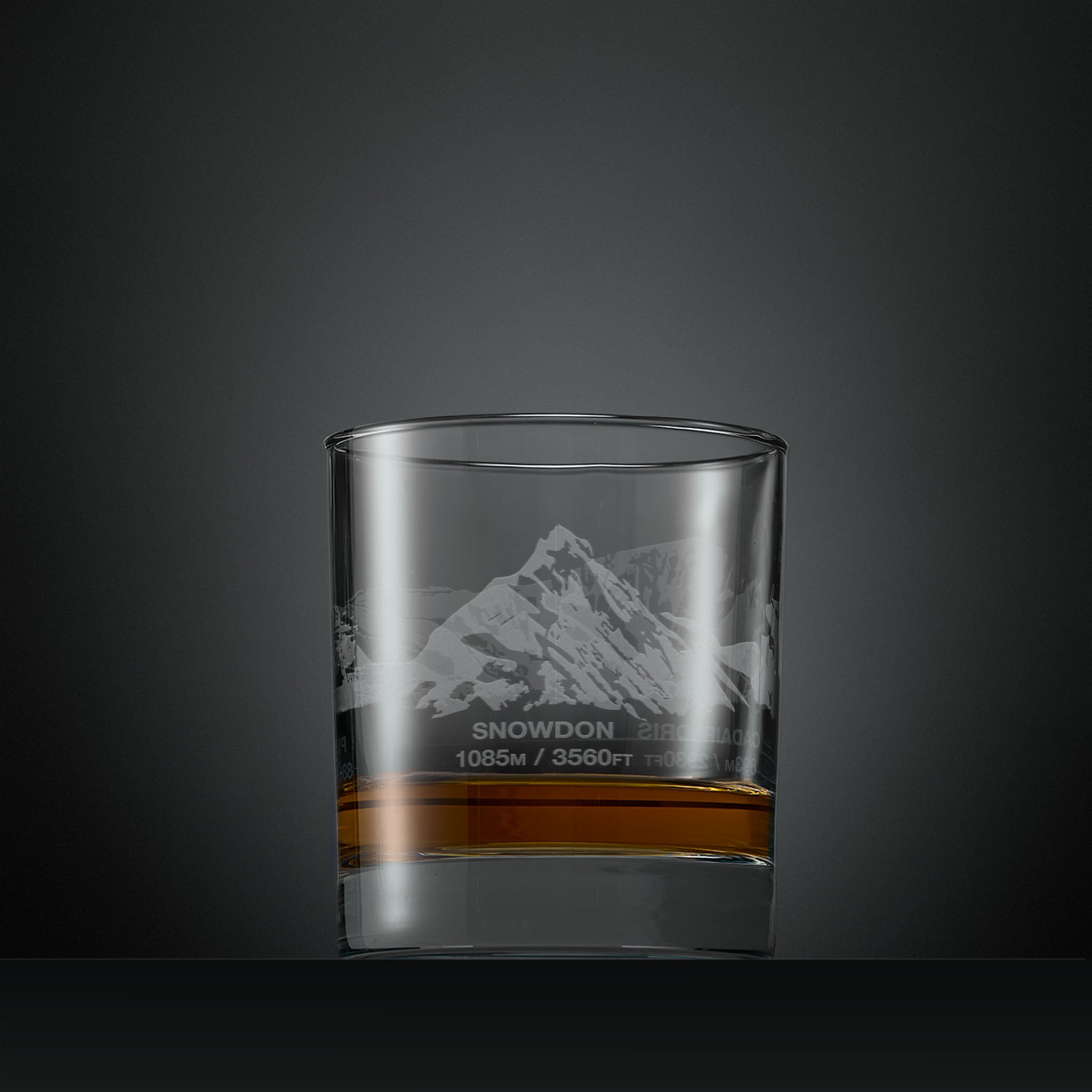 Engraved whisky glass with Welsh three peaks wrap-around design featuring Snowdon, Cadir Idris and Pen-Y-Fan
