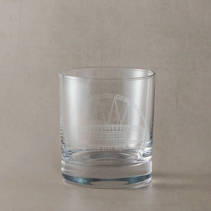 Whisky glass engraved with architectural line drawing of Wembley Stadium