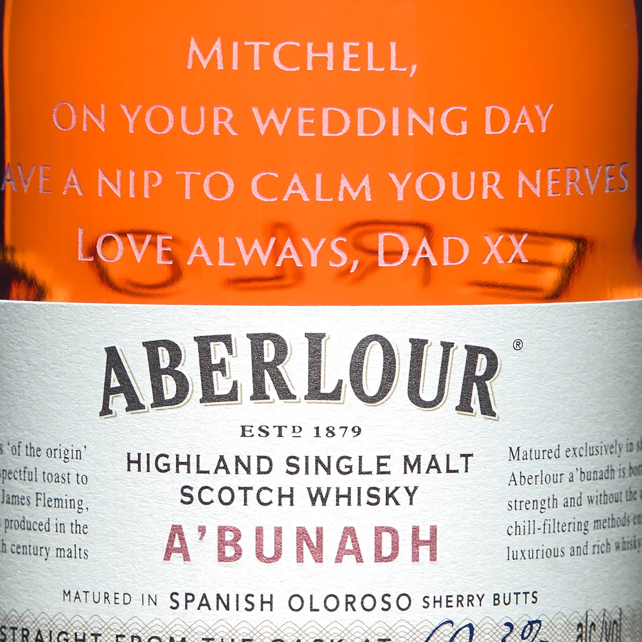 Whisky bottle label with engraved personalised message.