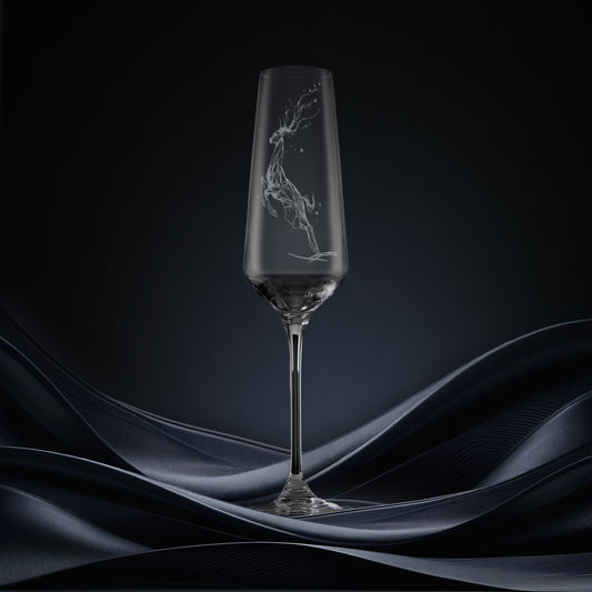 Engraved champagne flute featuring a leaping stag forming a constellation of stars