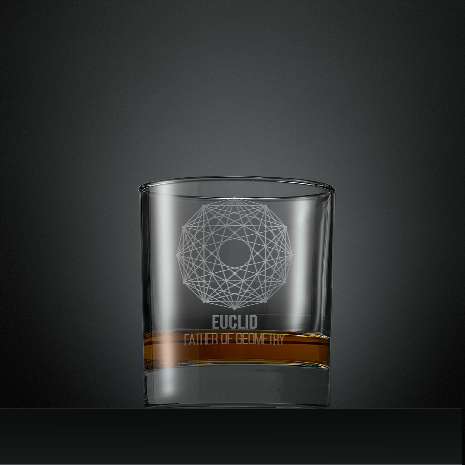 Engraved whisky glass with geometric design and 'Euclid, Father of Geometry' text