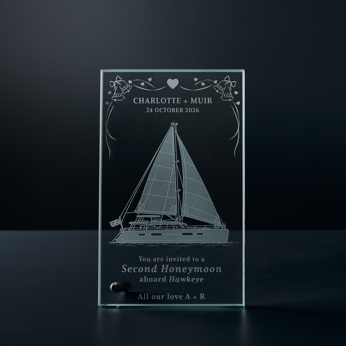 Engraved invitation glass display plaque featuring a sailing yacht, decorative border and personalised lettering