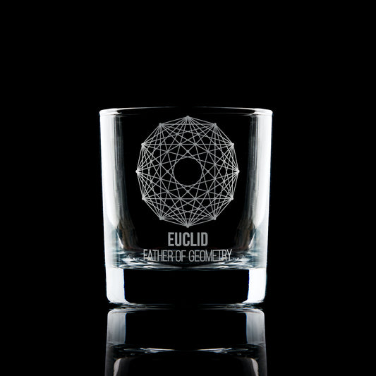 Engraved whisky glass featuring a geometric Dodecagram and Euclid inscription, photographed on black to highlight engraving clarity.