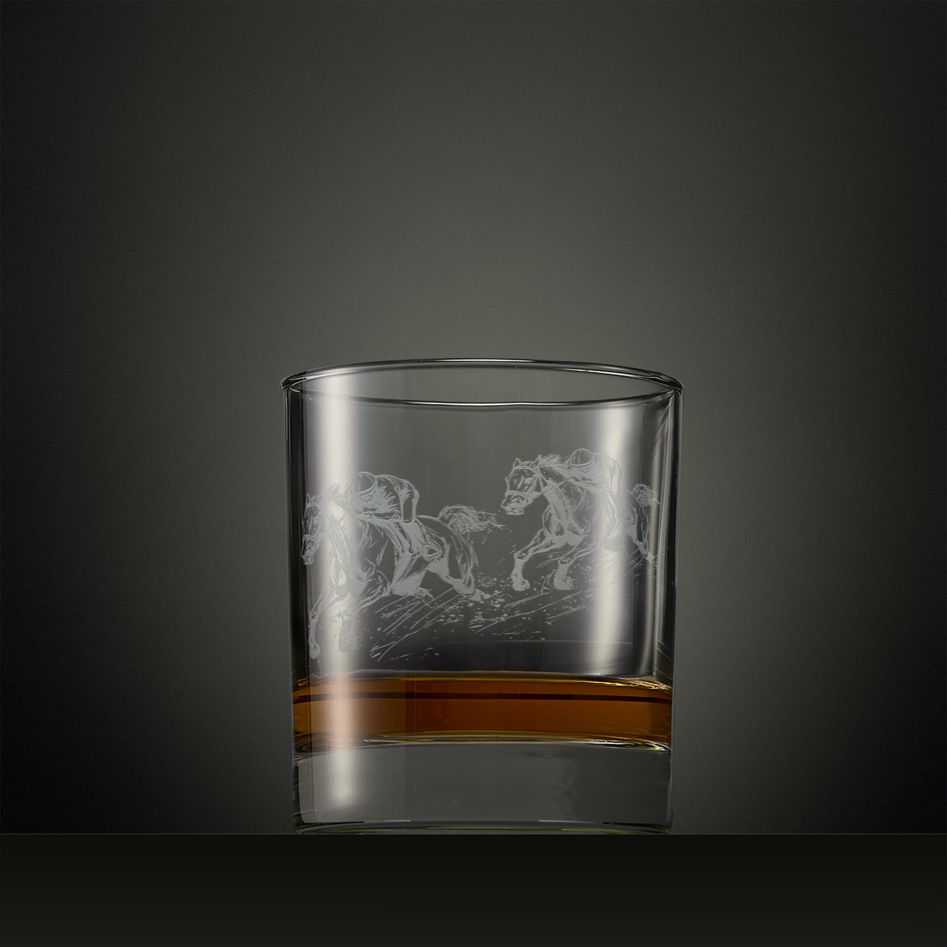 Whisky glass engraved with galloping racehorses, personalised horse racing gift.