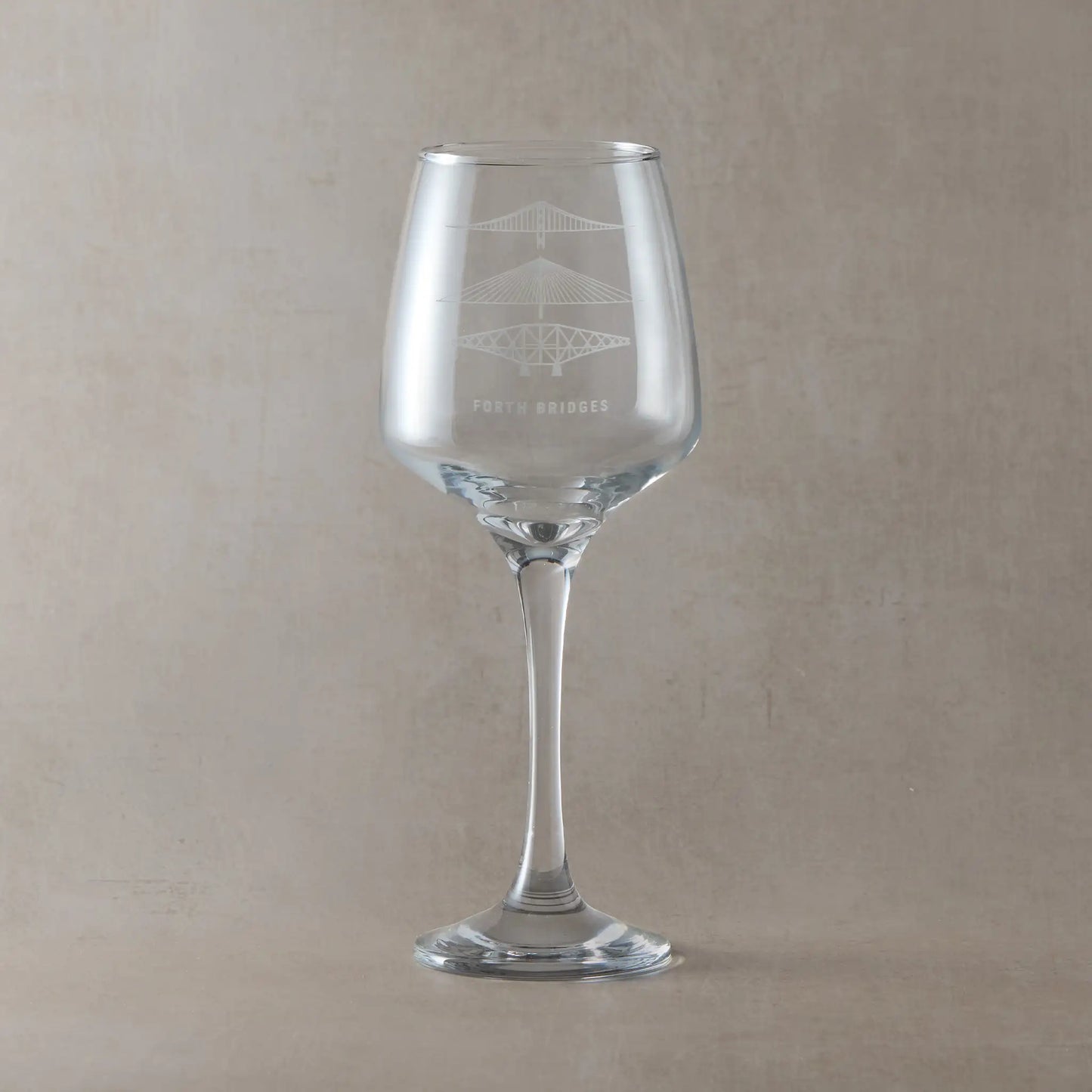 Wine glass engraved wiith forth rail bridge, forth road bridge and queensferry crossing.