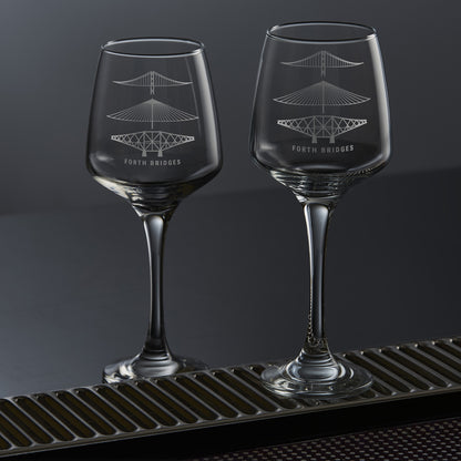 pair of wine glasses engraved with the forth rail bridge, forth road bridge and queensferry crossing