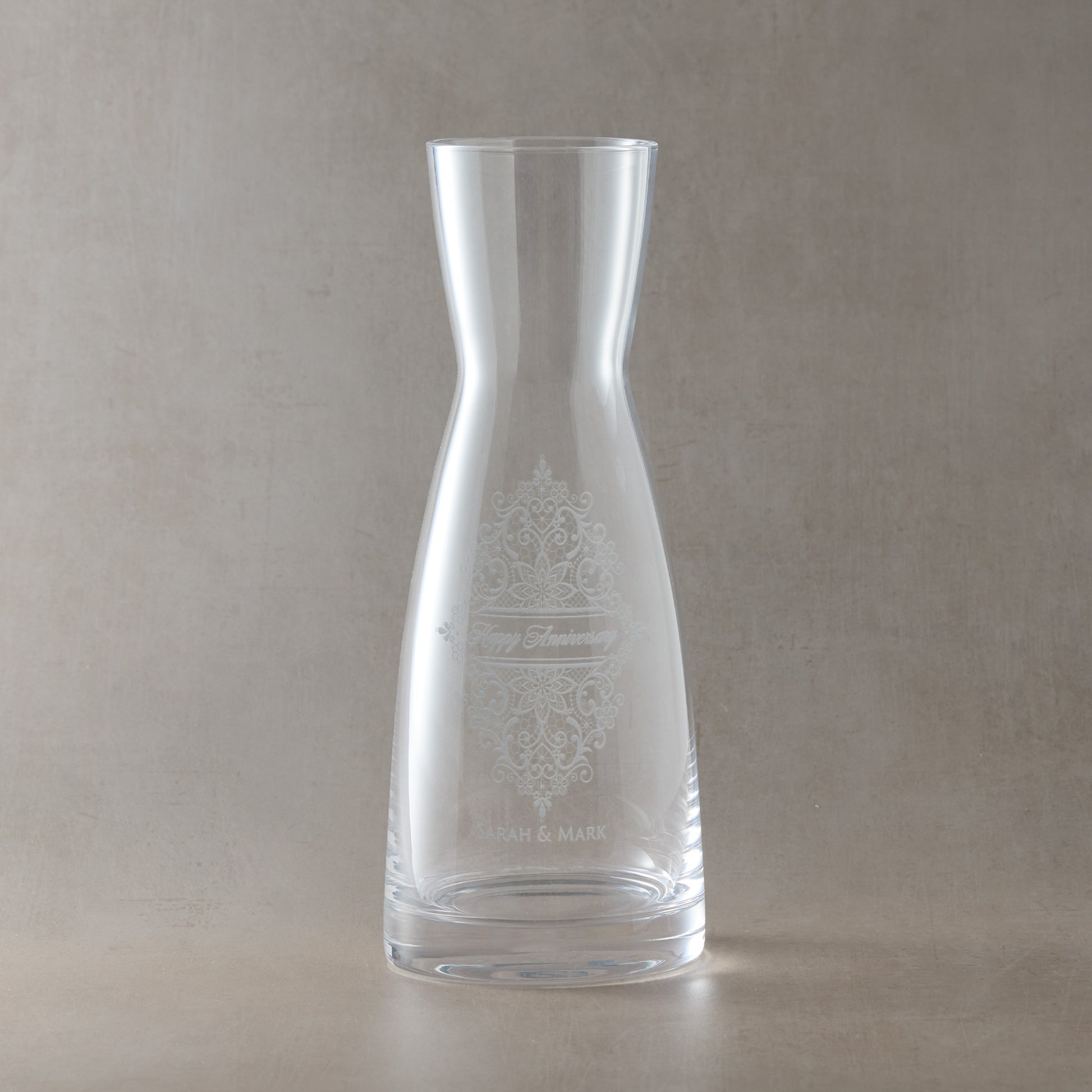 Engraved water or wine carafe featuring a guipure lace design and personalised with Happy Anniversary