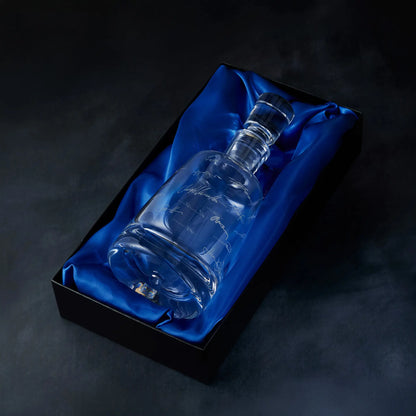 Engraved handritten signatures decanter presented in a satin-lined gift box, photographed on deep blue background