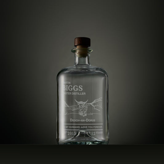 Engraved apothecary-style decanter with a Highland cow, Gaelic text and personalised message