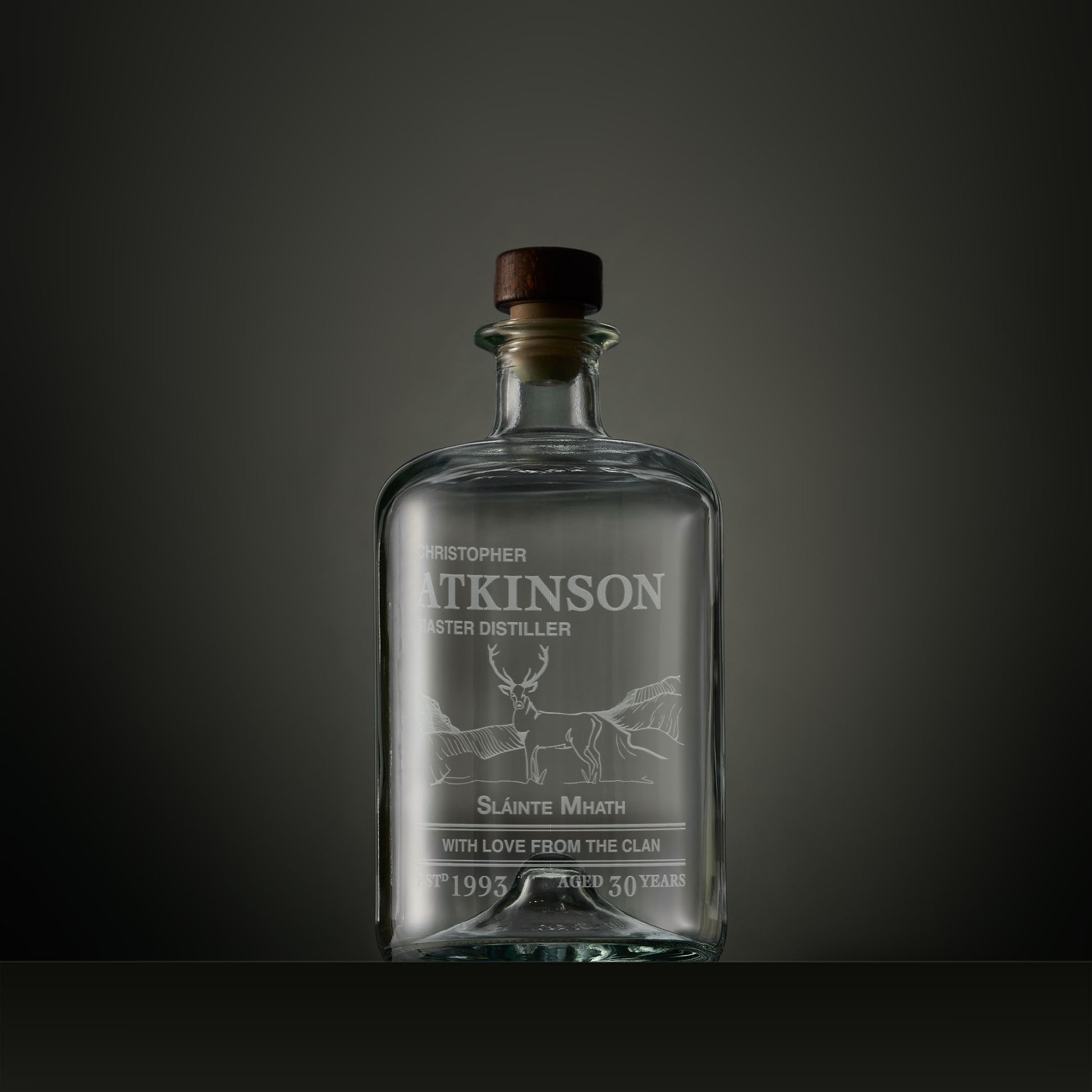 Engraved apothecary-style decanter with a Highland stag, Gaelic text and personalised message