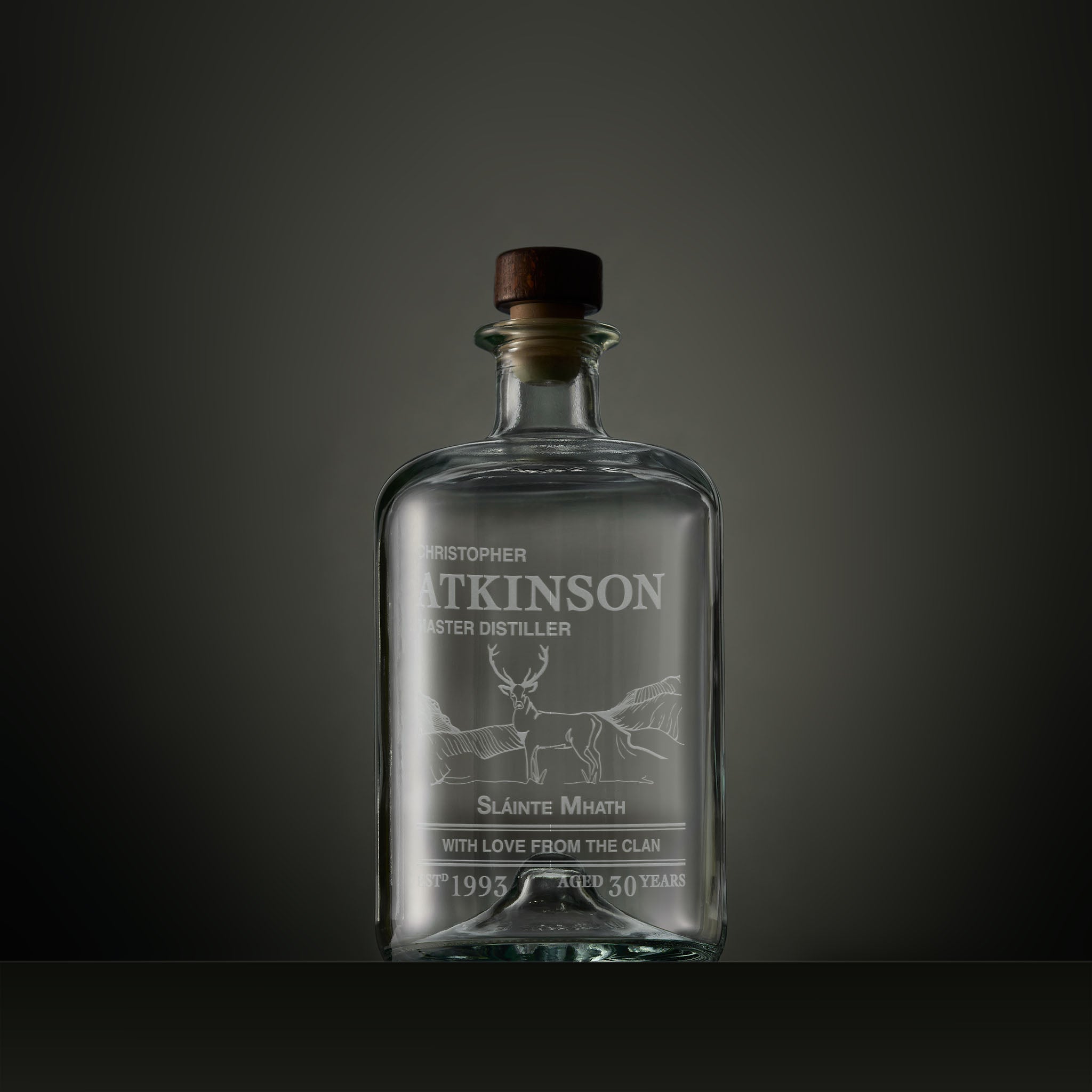 Engraved apothecary-style decanter with a Highland stag, Gaelic text and personalised message