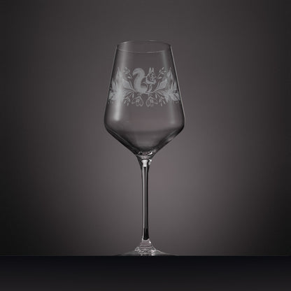 Engraved wine glass with snowdrops and red squirrel design