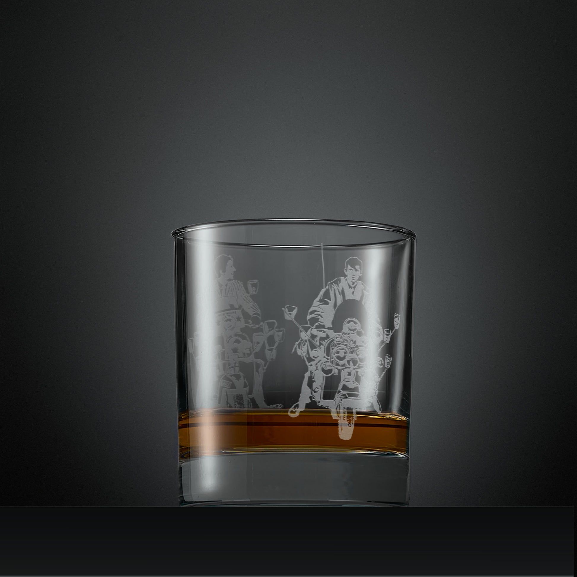 Engraved whisky glass with Jimmy riding Vespa GS and Lambretta LI scooter designs