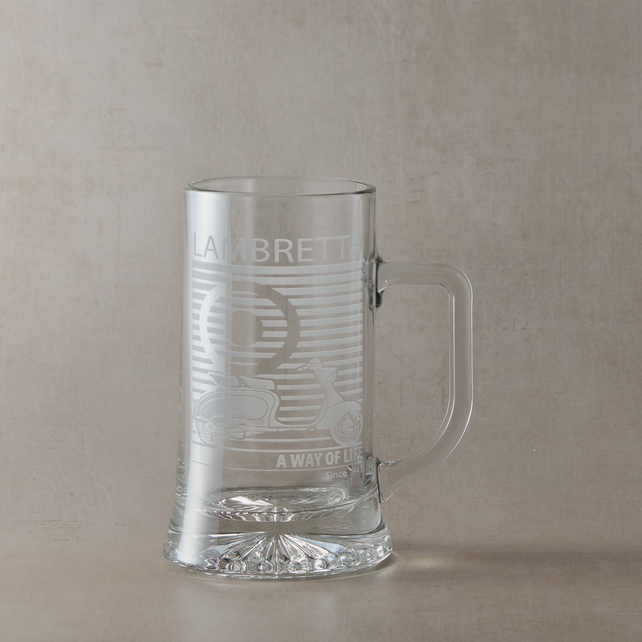 Lambretta Li125 Series 1 engraved tankard with handle right, photographed on neutral beige background.