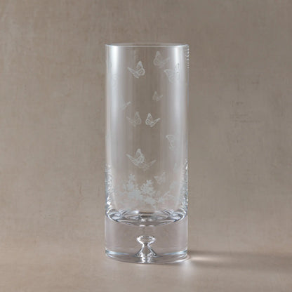 Engraved flower vase featuring butterflies, birds and blossom 