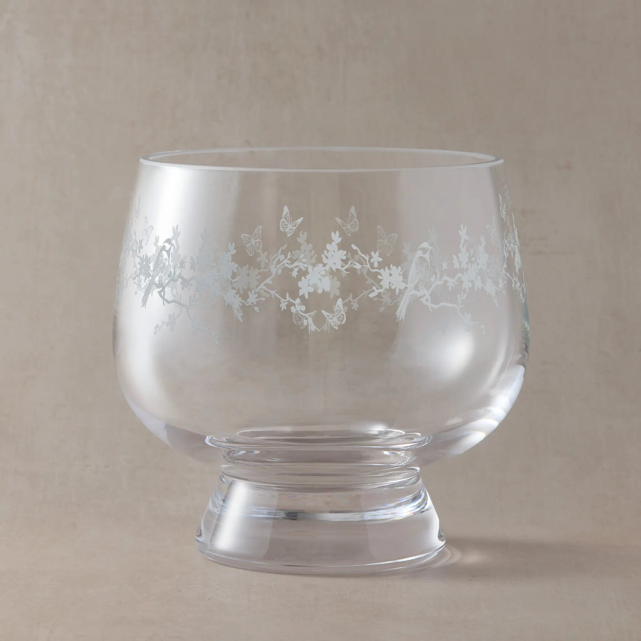 Engraved presentation bowl with floral garland, garden birds and butterflies, wrapped around the glass.