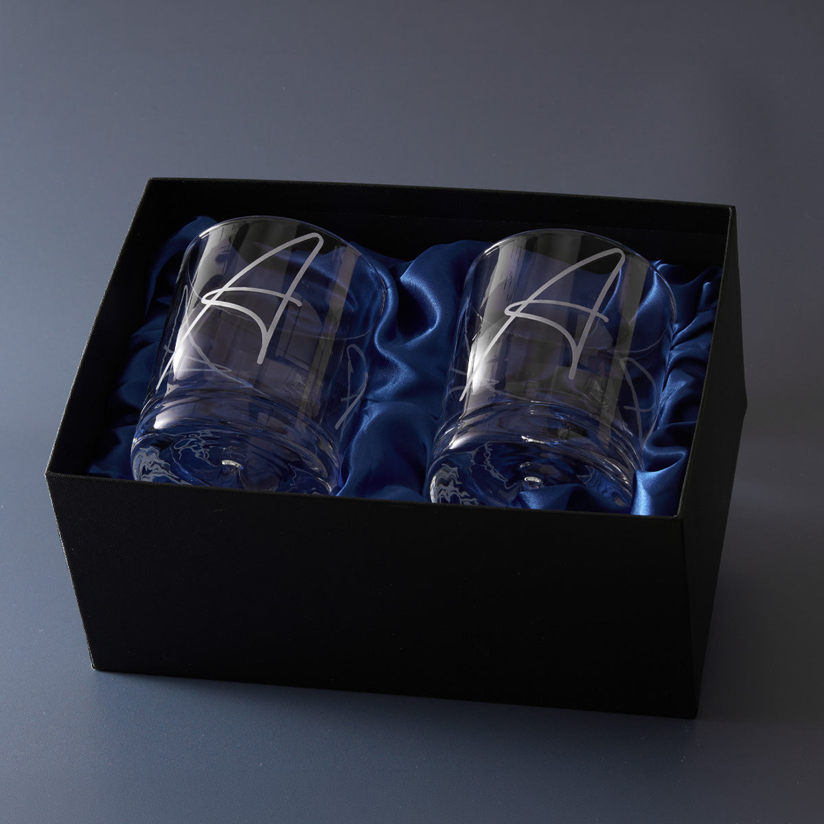 BLOG__Two whisky glasses with engraved design in a black box with blue lining