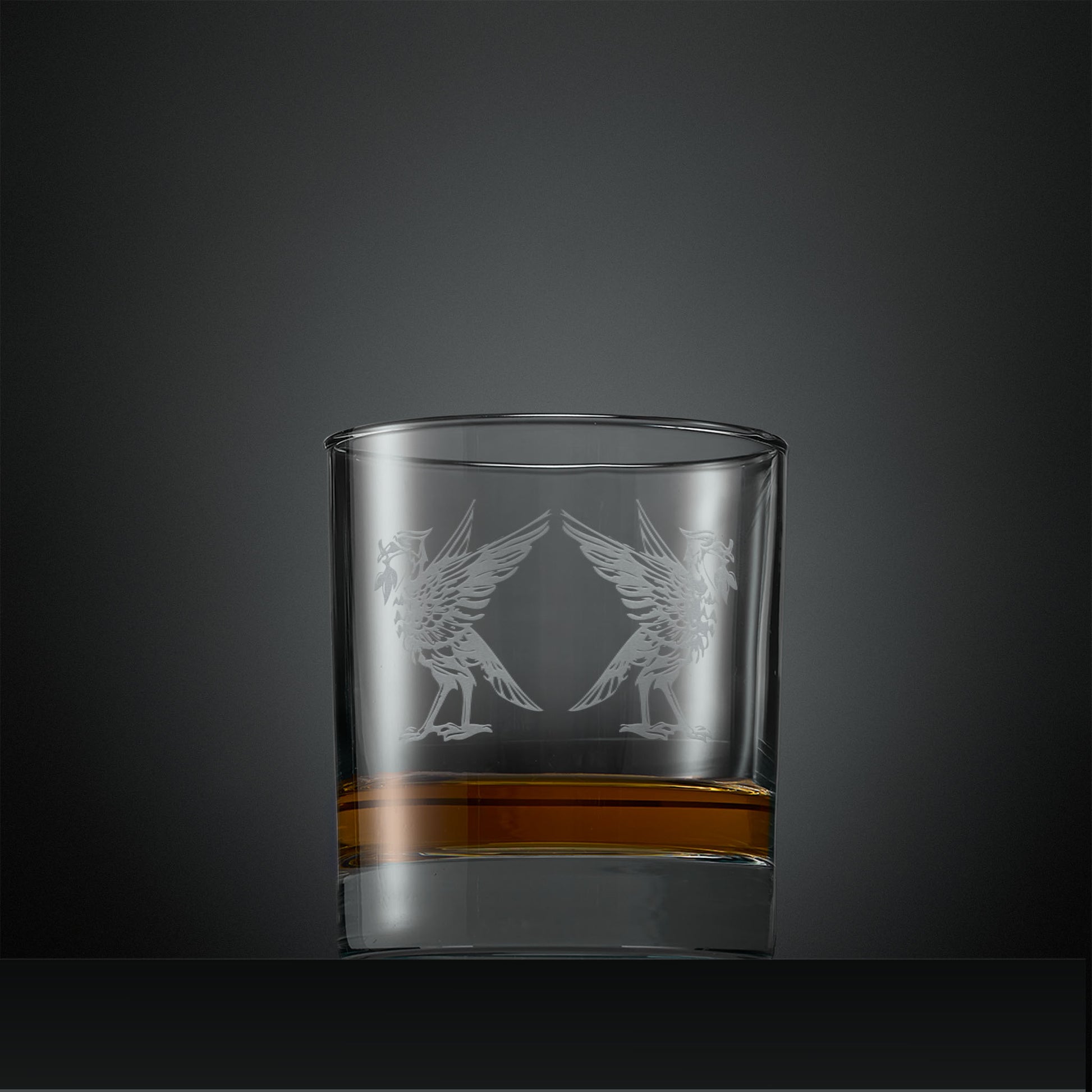 Engraved whisky glass with two Liverbirds facing away from each other