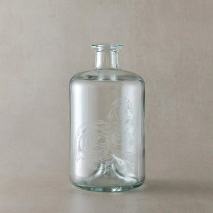 Celtic decanter bottle engraved with a knotwork horse, circles and flowing anamorphic ribbon design