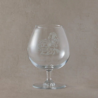 Engraved brandy glass with an  illustration of a celtic knotwork horse