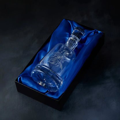 Engraved horse design spirit decanter presented in a satin-lined gift box, photographed against a deep blue background