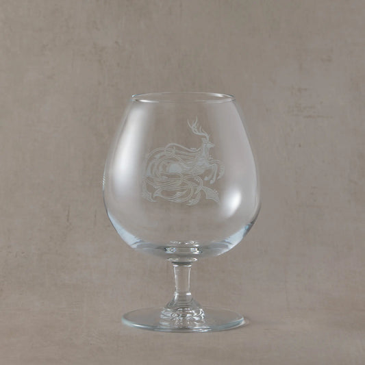 Engraved brandy glass featuring a Celtic stag and knotwork design, handmade in Scotland.