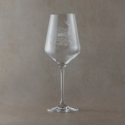 Wine glass engraved with a Celtic stag with entwined anamorphic waves