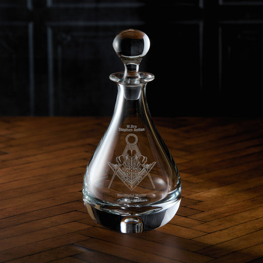 Engraved wine decanter with masonic lodge crest, with ground glass spherical stopper