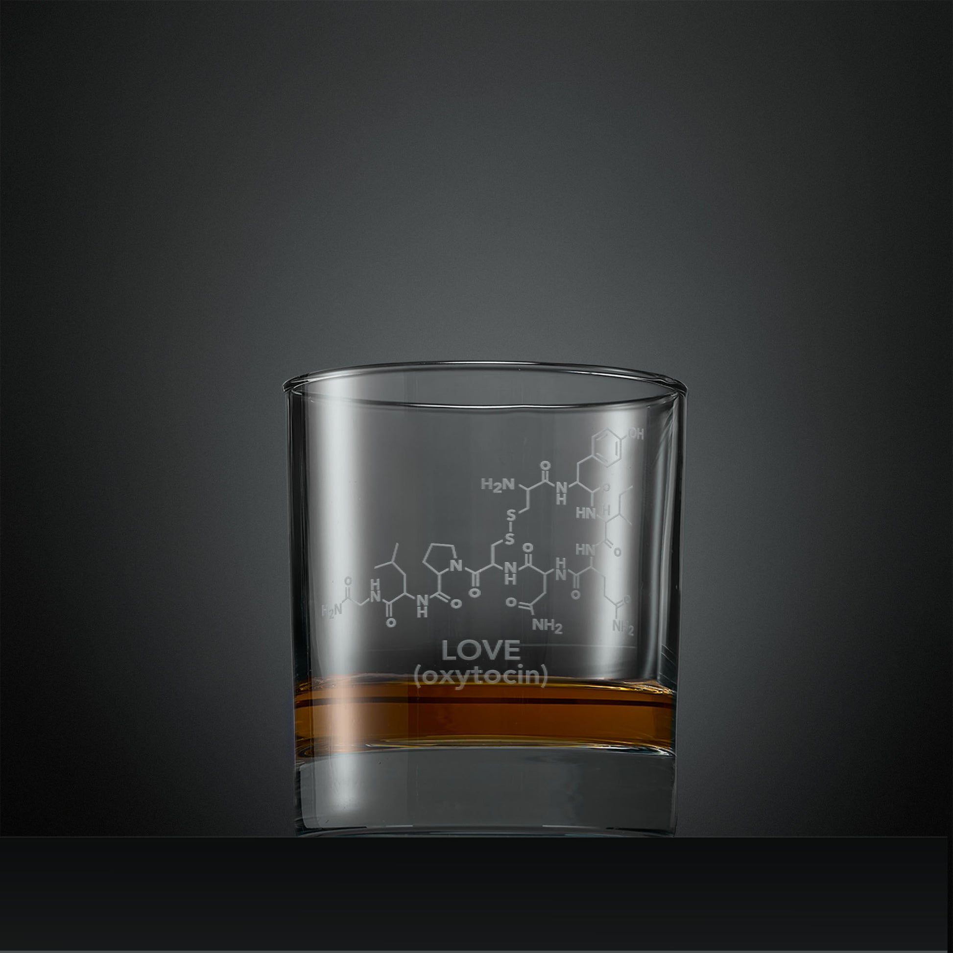 Engraved Whisky glass with molecular design and 'LOVE (oxytocin)' text