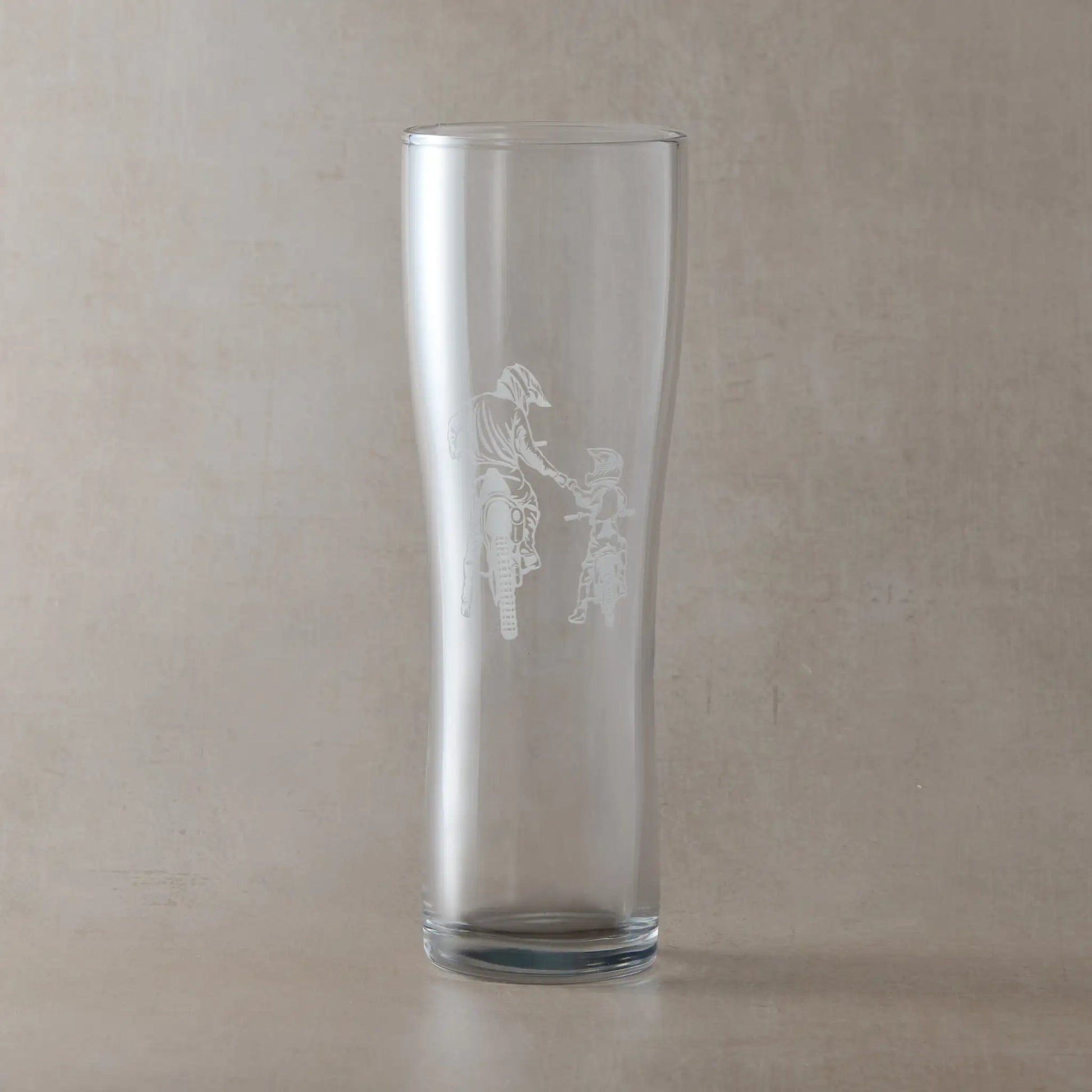 Engraved pint glass with a dirt bike ‘Best Friends for Life’ motocross design showing two bikers riding together