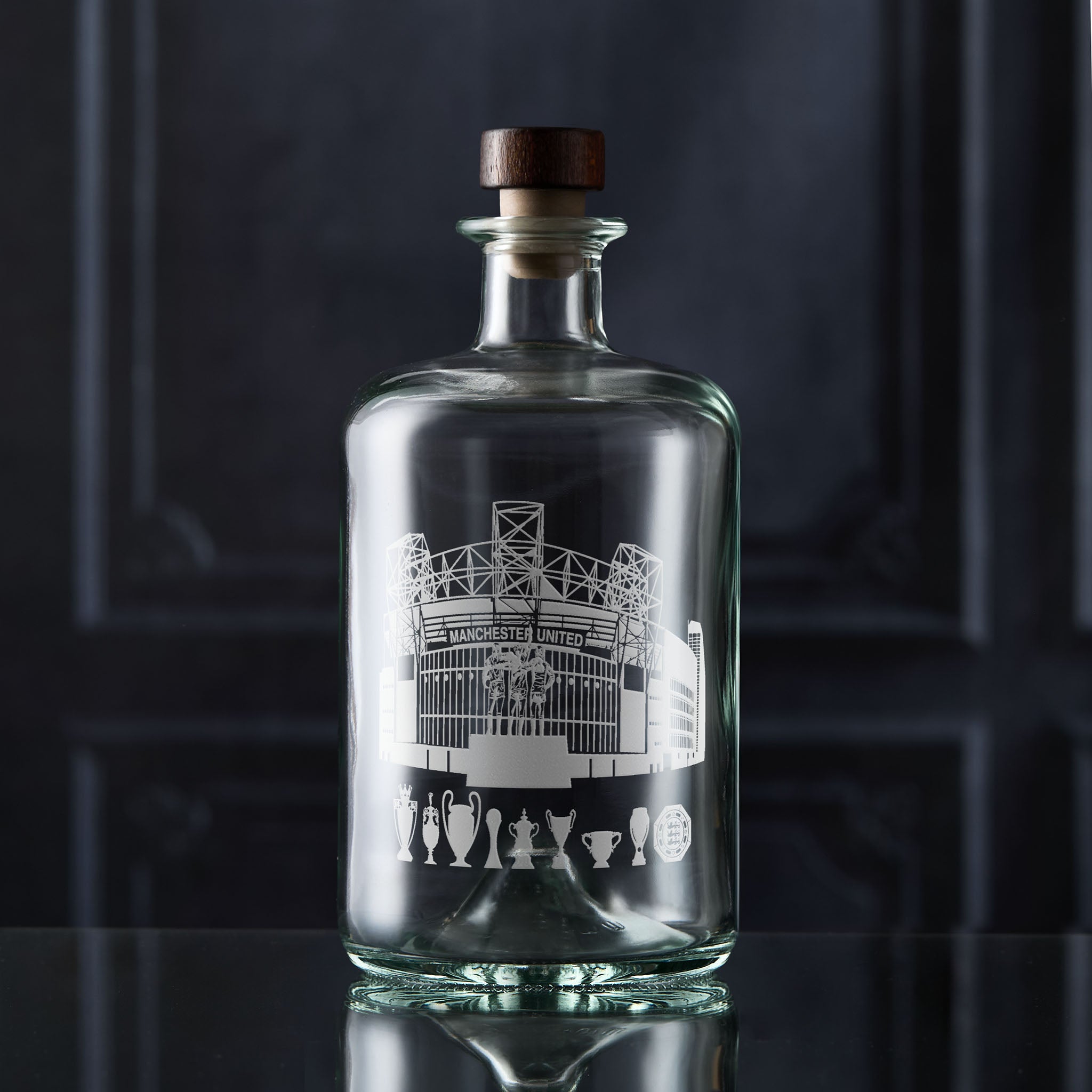 Manchester decanter engraved with Old Trafford and football trophies
