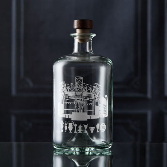 Manchester decanter engraved with Old Trafford and football trophies