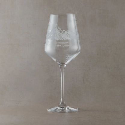 Engraved wine glass featuring a wraparound National Three Peaks design with Snowdon facing forward.