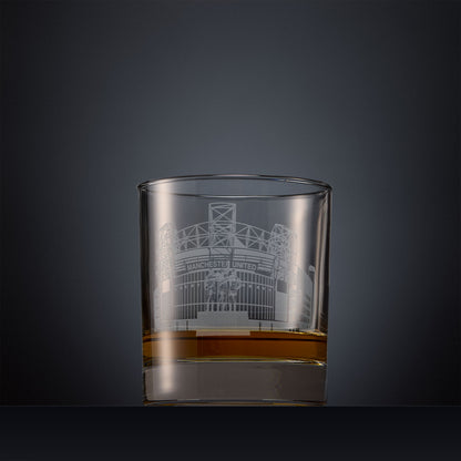 Engraved whisky glass with Old Trafford, Manchester's football stadium on a black background
