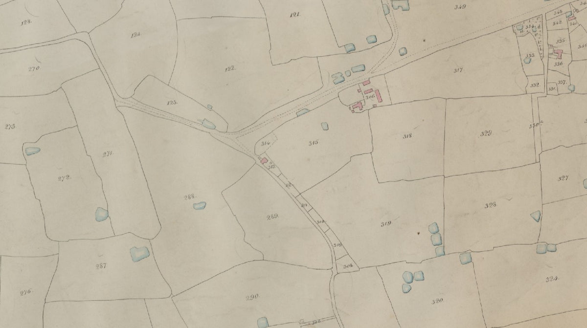A close-up of a vintage topographical map or land survey drawing, showing field boundaries, roads, and small blue and red details on aged beige paper.