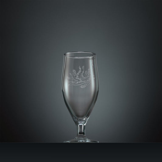 Engraved stemmed beer glass with a peacock, trailing leaves and feathers design