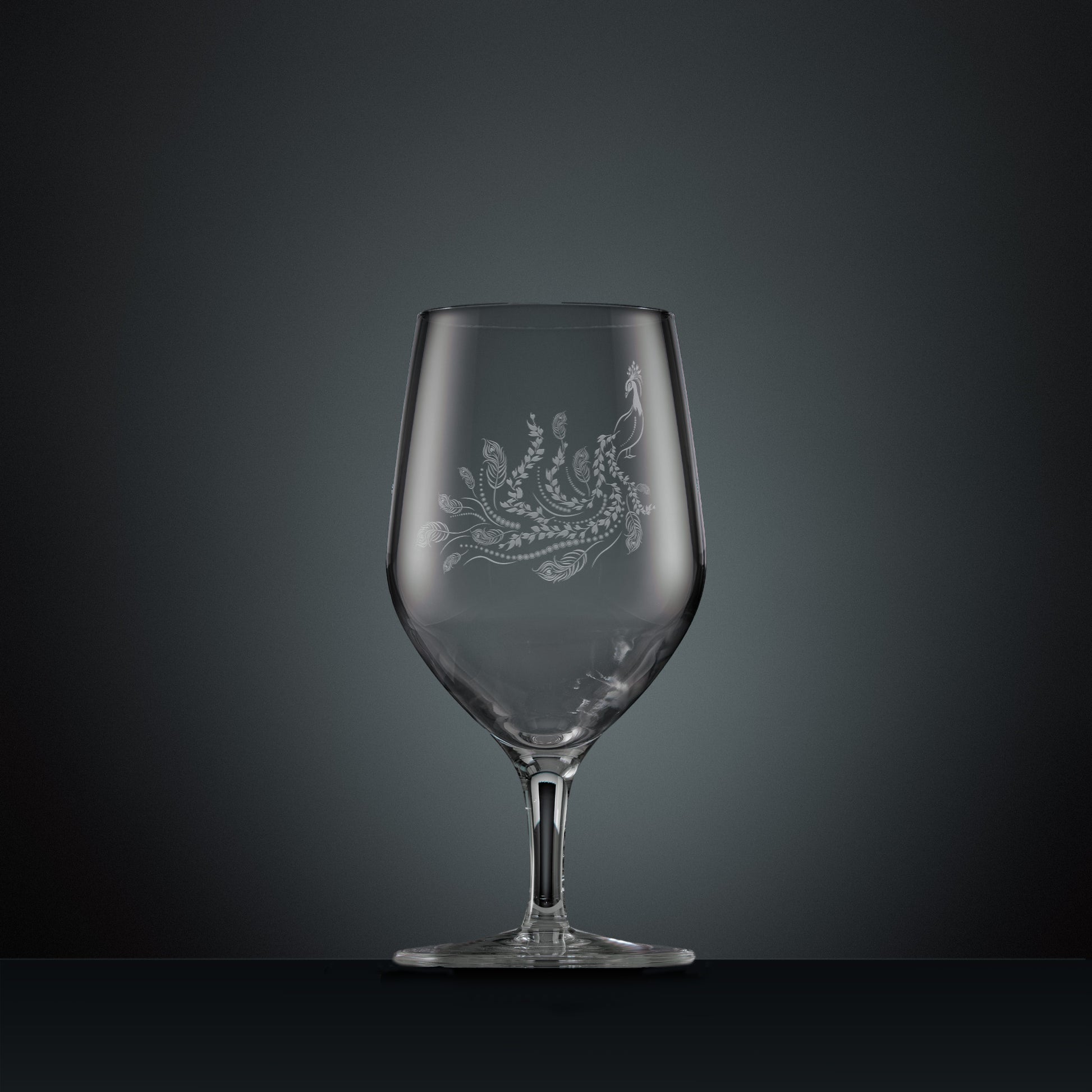 Engraved mineral water glass with peacock and trailing leaves illustration