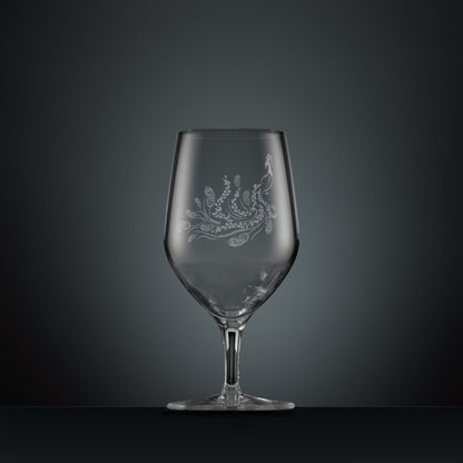Engraved mineral water glass with peacock and trailing leaves illustration