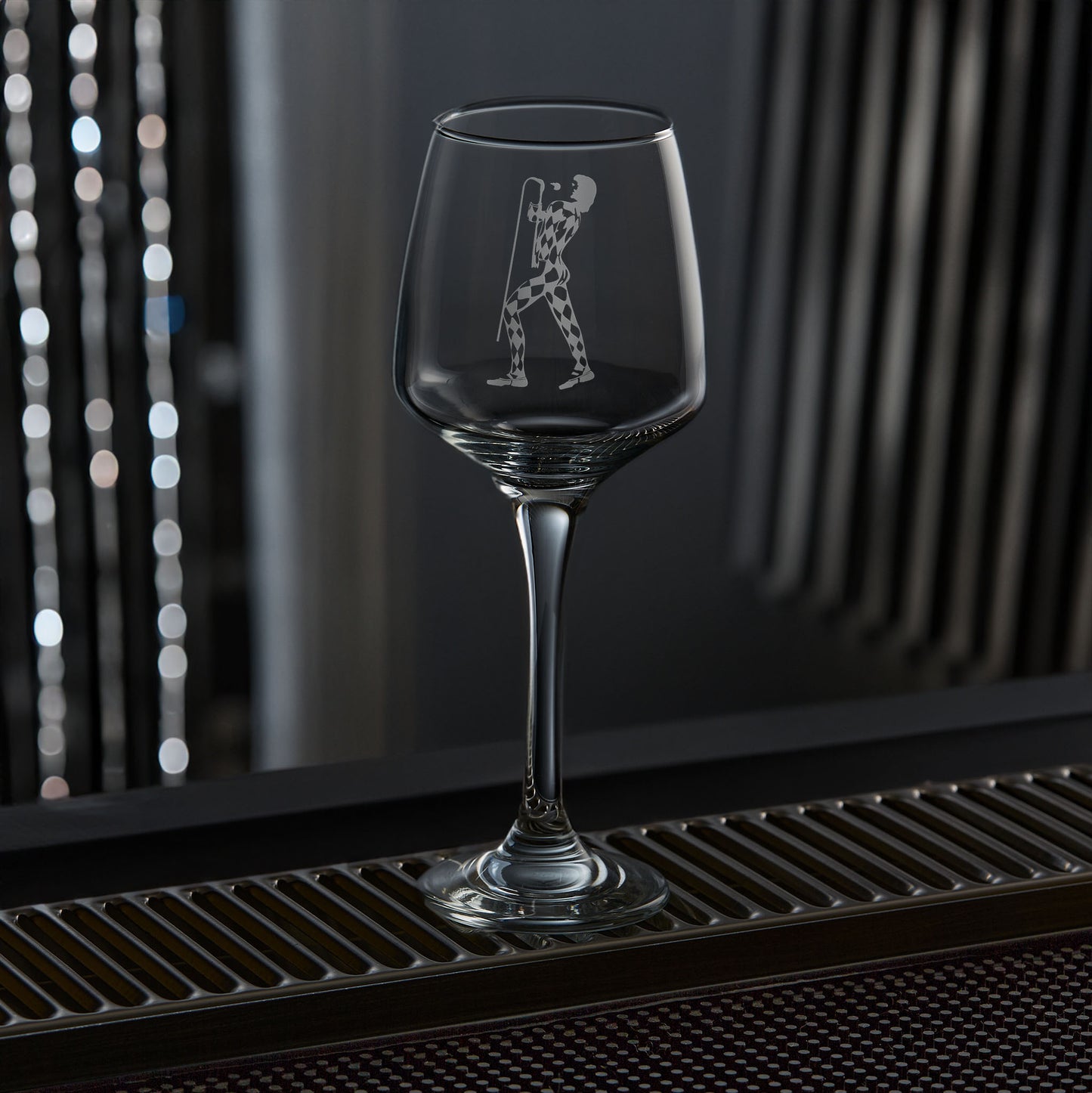 stemmed wine glass engraved with Queen's freddie mercury