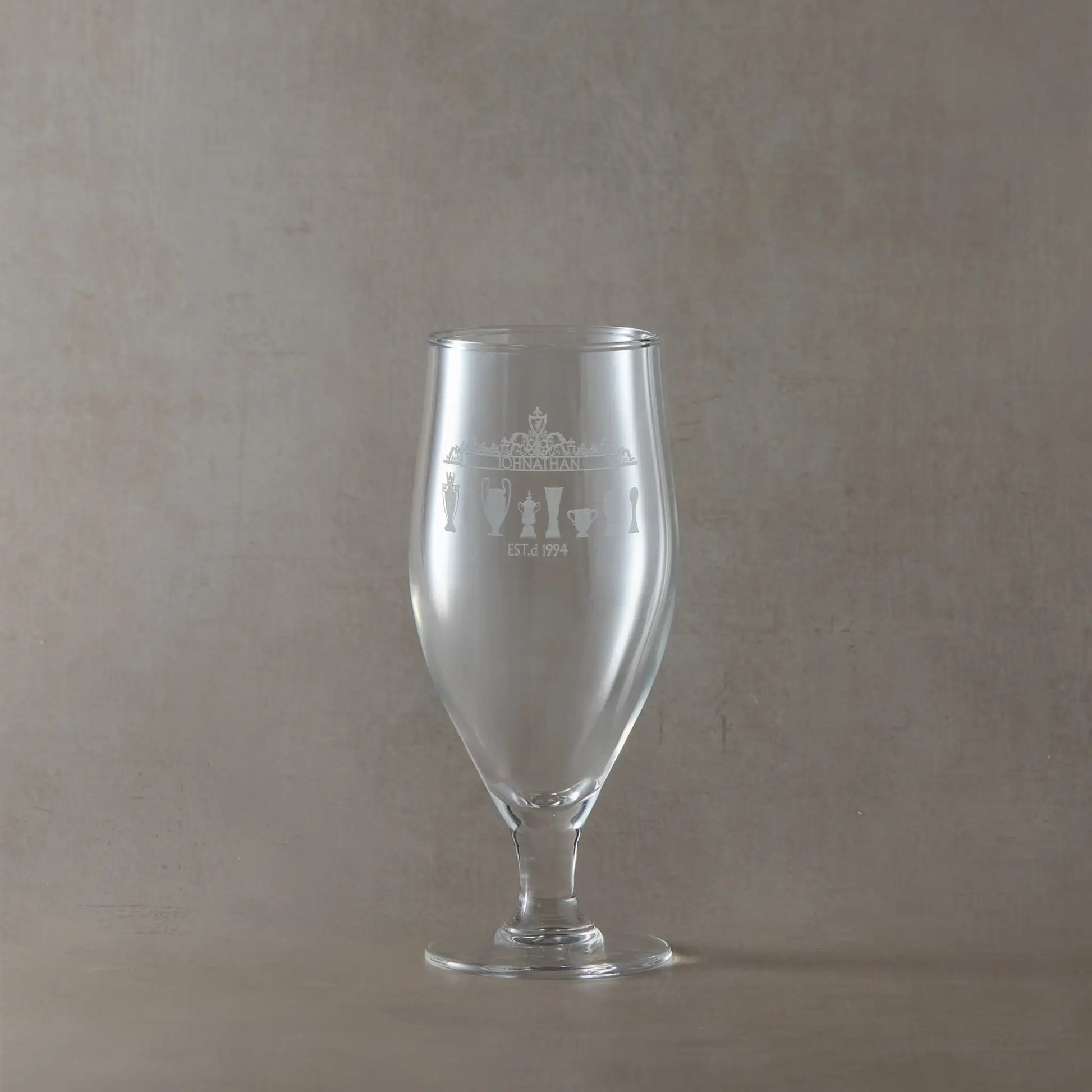 Personalised beer glass engraved with Shankly gates overthrow and trophy sillhouettes